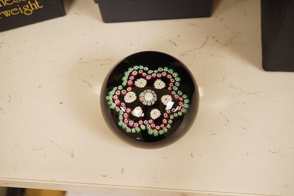 Four Caithness boxed paperweights to include ‘Garland’ and boxed Langham paperweight